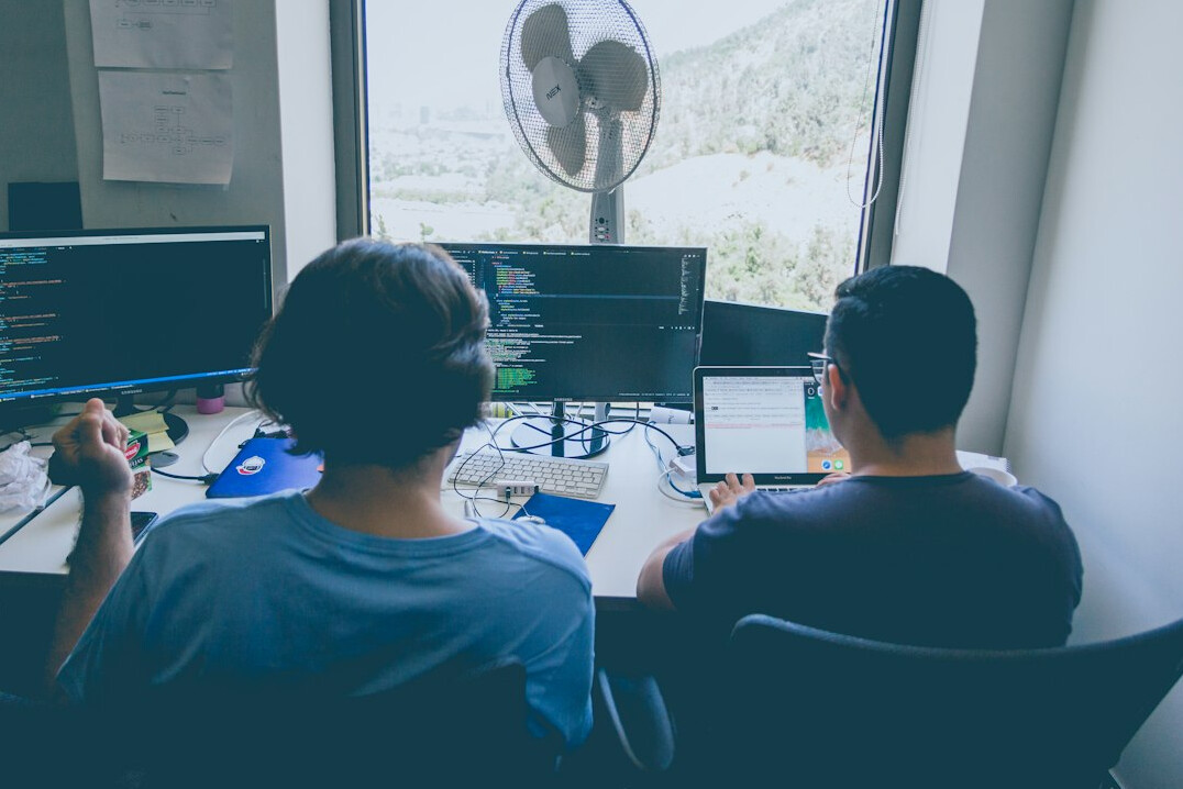 group of programmers collaborating