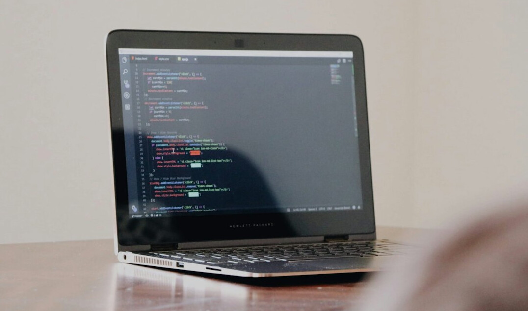 beginner learning coding on laptop