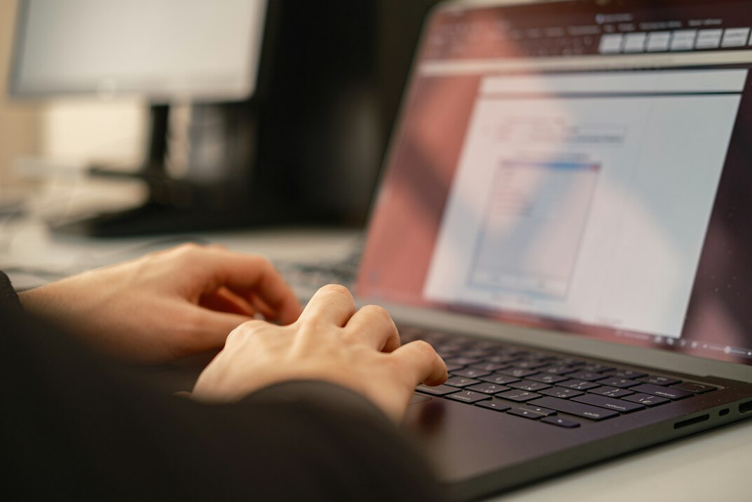 beginner learning coding on laptop