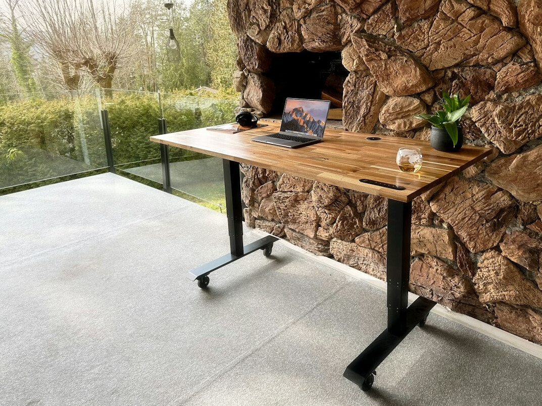 Modern office desk with laptop and notebook