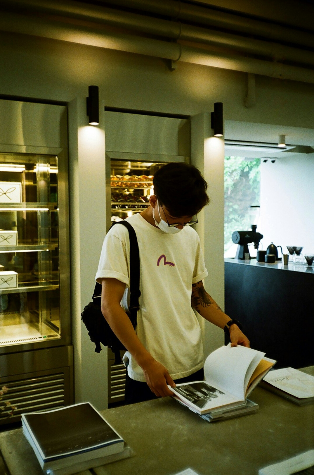 Person reading technical documentation at a desk
