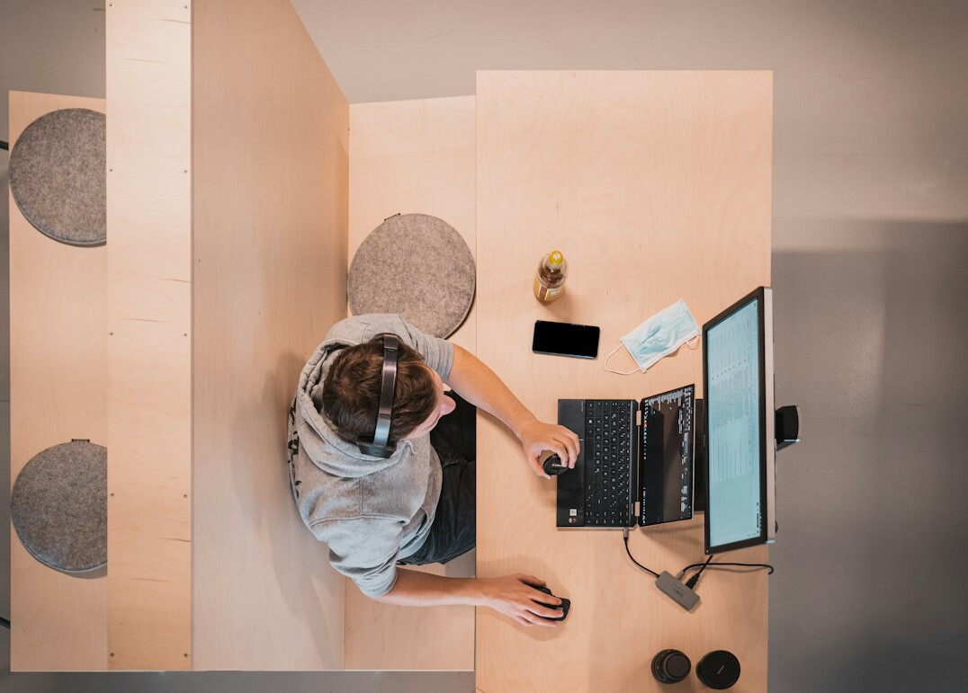 person learning coding at desk